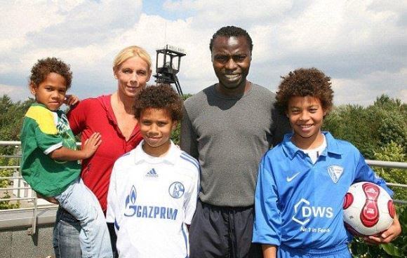 Souleymane Sane with his wife and children.